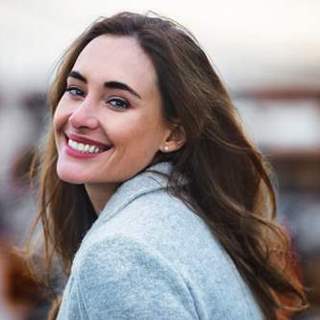 Smiling girl looking back