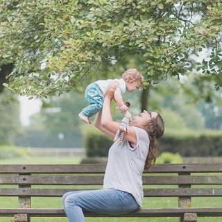 Mum and toddler on park bench